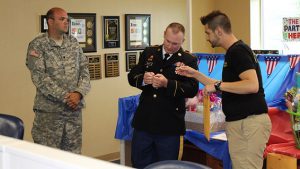 Servicemen Knouse and Miller draw the names of the winners!