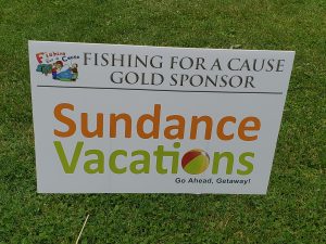 Sundance Vacations Fishing for a Cause gold sponsor sign